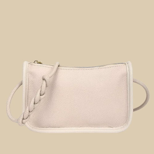 Vegan Leather Clutch Bag for Women, Evening and Wedding Purse in Black, styled as a SheSelects summer accessory