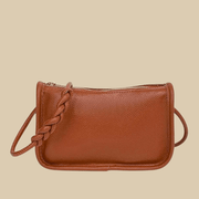 Vegan Leather Clutch Bag for Women, Evening and Wedding Purse in Black, styled as a SheSelects summer accessory