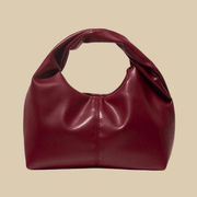 Vegan Leather Hobo Bag for Women, Slouchy Everyday Shoulder Purse in Burgundy, styled as a SheSelects summer accessory