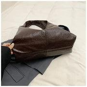 Vegan Leather Hobo Bag for Women, Slouchy Everyday Shoulder Purse in Burgundy, styled as a SheSelects summer accessory