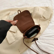 Mini Straw Summer Bag for Women, Natural Summer Vacation Purse in Light Brown, styled as a SheSelects summer accessory