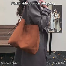 Braune Hobo-Tasche in Wildlederoptik, weiche Schultertasche aus veganem Leder