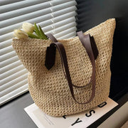 Raffia Tote Bag for Women, Woven Summer Beach and Vacation Purse in Coffee, styled as a SheSelects summer accessory