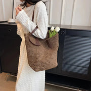 Raffia Tote Bag for Women, Woven Summer Beach and Vacation Purse in Coffee, styled as a SheSelects summer accessory