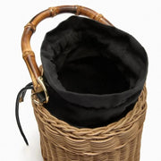 Rattan Bucket Bag for Women, Boho Summer Vacation Purse in Brown, styled as a SheSelects summer accessory