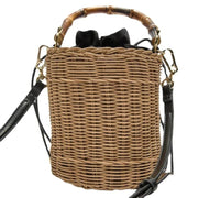 Rattan Bucket Bag for Women, Boho Summer Vacation Purse in Brown, styled as a SheSelects summer accessory