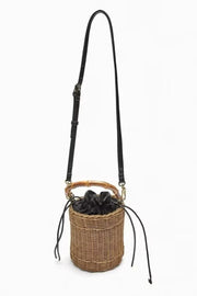 Rattan Bucket Bag for Women, Boho Summer Vacation Purse in Brown, styled as a SheSelects summer accessory