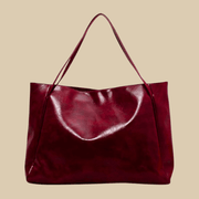Vegan Leather Tote Bag for Women, Soft Everyday Shoulder Purse in Wine Red, styled as a SheSelects summer accessory