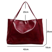 Vegan Leather Tote Bag for Women, Soft Everyday Shoulder Purse in Wine Red, styled as a SheSelects summer accessory