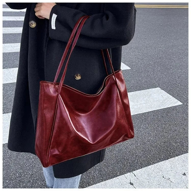 Vegan Leather Tote Bag for Women, Soft Everyday Shoulder Purse in Wine Red, styled as a SheSelects summer accessory