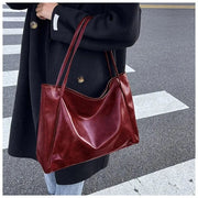 Vegan Leather Tote Bag for Women, Soft Everyday Shoulder Purse in Wine Red, styled as a SheSelects summer accessory