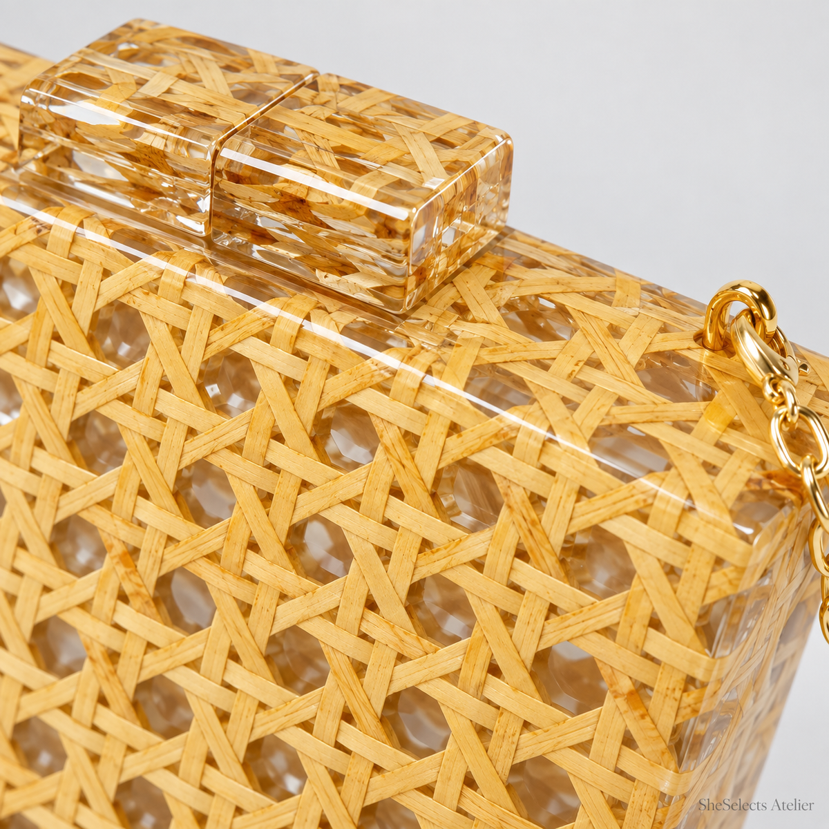 Detail of woven lattice, clear acrylic and matching clasp