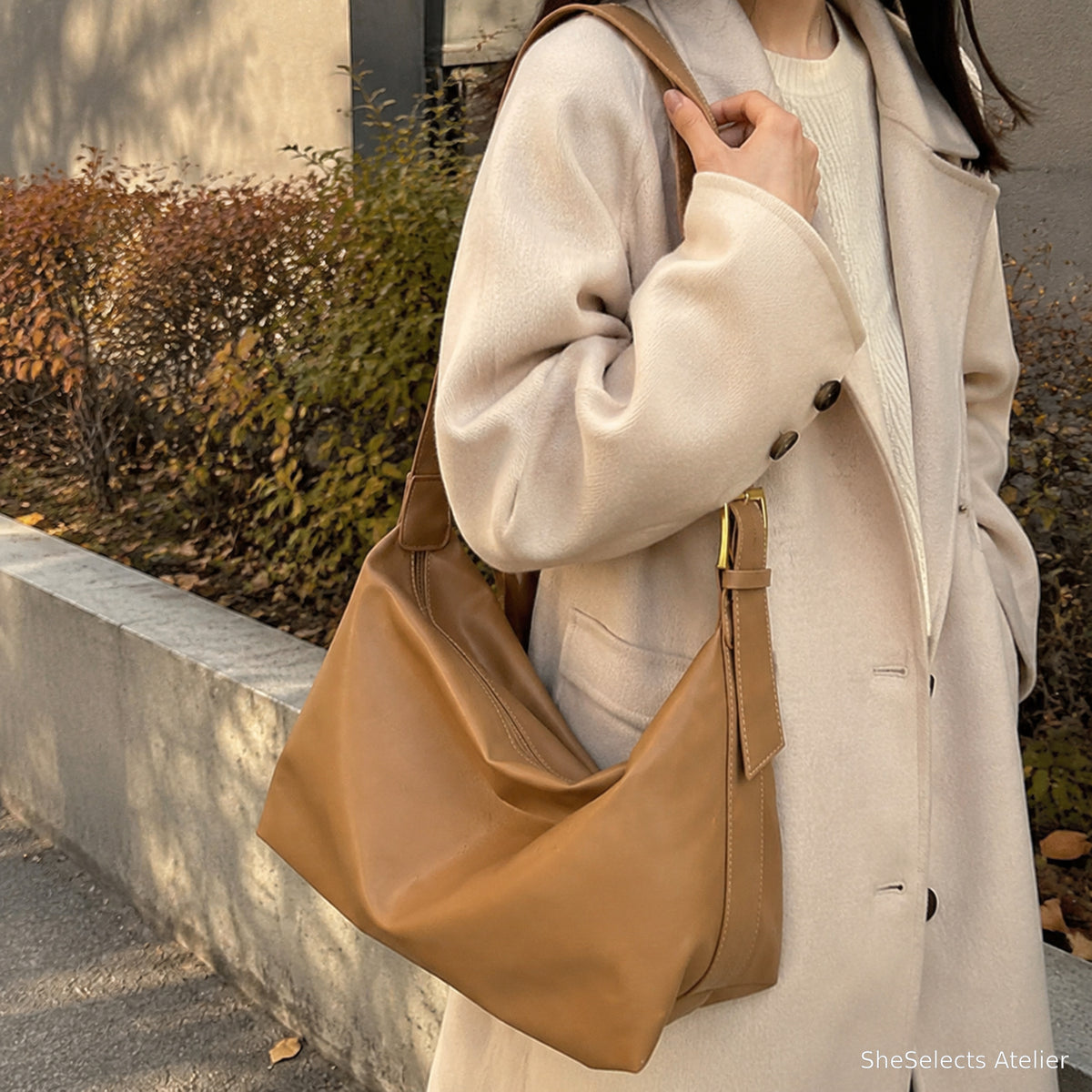 Khaki slouchy shoulder tote styled for fall