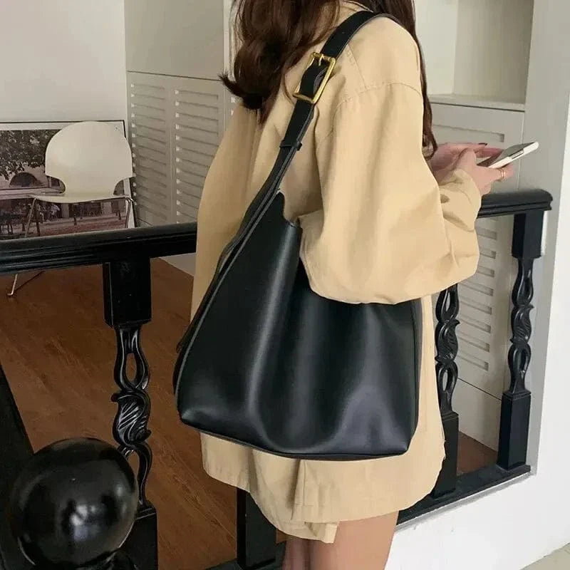 Small Vegan Leather Tote Bag for Women, Soft Everyday Shoulder Purse in Black, styled as a SheSelects summer accessory