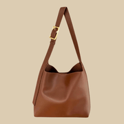 Small Vegan Leather Tote Bag for Women, Soft Everyday Shoulder Purse in Black, styled as a SheSelects summer accessory