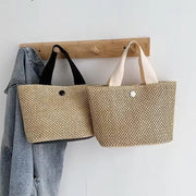 Small Raffia Summer Bag for Women, Natural Summer Vacation Purse in Black, styled as a SheSelects summer accessory