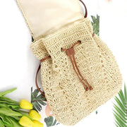 Straw Backpack for Women, Lightweight Summer Travel Bag in Light Brown, styled as a SheSelects summer accessory