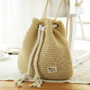 Straw Bucket Bag for Women, Boho Summer Vacation Purse in Black, styled as a SheSelects summer accessory