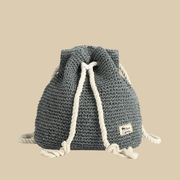 Straw Bucket Bag for Women, Boho Summer Vacation Purse in Black, styled as a SheSelects summer accessory