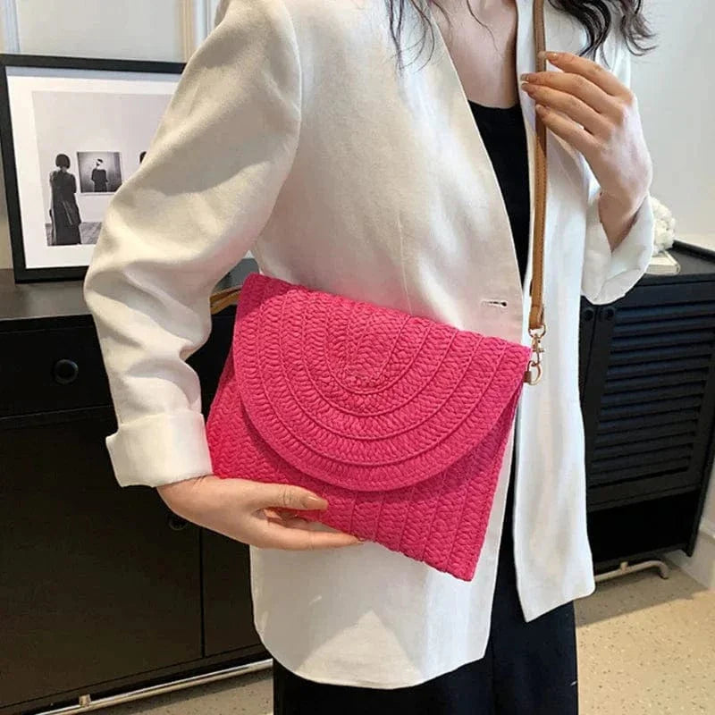 Straw Clutch Bag for Women, Summer Wedding and Bridesmaid Purse in Hot Pink, styled as a SheSelects summer accessory