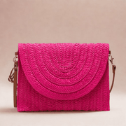 Straw Clutch Bag for Women, Summer Wedding and Bridesmaid Purse in Hot Pink, styled as a SheSelects summer accessory