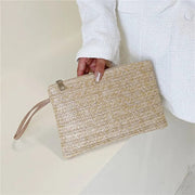 Straw Clutch Bag for Women, Summer Wedding and Bridesmaid Purse in White, styled as a SheSelects summer accessory