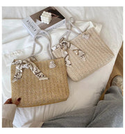 Straw Tote Bag for Women, Woven Summer Beach and Vacation Purse in Beige, styled as a SheSelects summer accessory