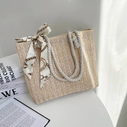 Straw Tote Bag for Women, Woven Summer Beach and Vacation Purse in Beige, styled as a SheSelects summer accessory