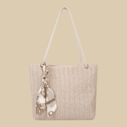 Straw Tote Bag for Women, Woven Summer Beach and Vacation Purse in Beige, styled as a SheSelects summer accessory