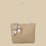 Straw Tote Bag for Women, Woven Summer Beach and Vacation Purse in Beige, styled as a SheSelects summer accessory