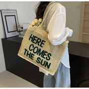 Straw Tote Bag for Women, Woven Summer Beach and Vacation Purse in Beige, styled as a SheSelects summer accessory