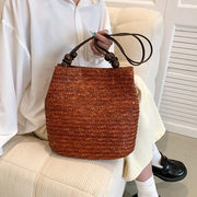 Straw Tote Bag for Women, Woven Summer Beach and Vacation Purse in Beige, styled as a SheSelects summer accessory
