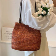 Straw Tote Bag for Women, Woven Summer Beach and Vacation Purse in Beige, styled as a SheSelects summer accessory
