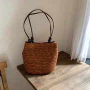 Straw Tote Bag for Women, Woven Summer Beach and Vacation Purse in Beige, styled as a SheSelects summer accessory