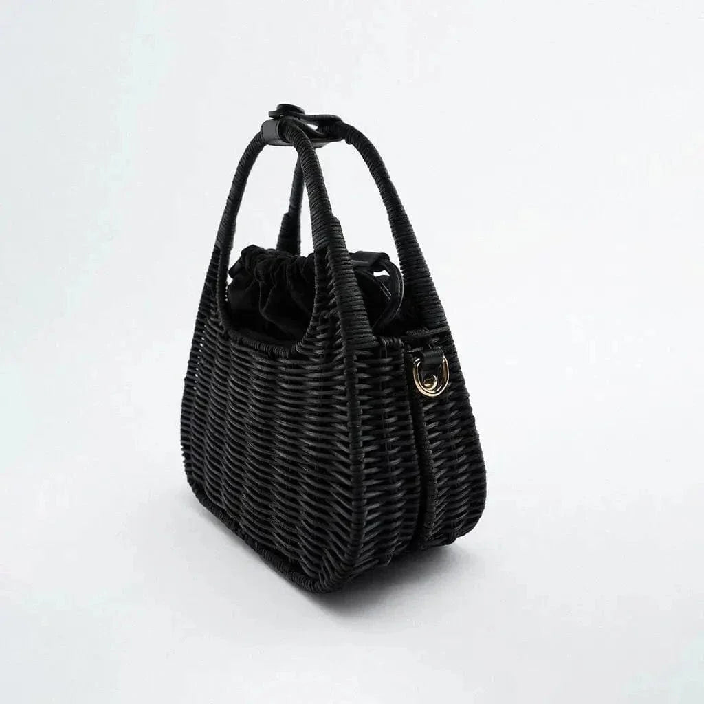 Wicker Summer Bag for Women, Natural Summer Vacation Purse in Black, styled as a SheSelects summer accessory