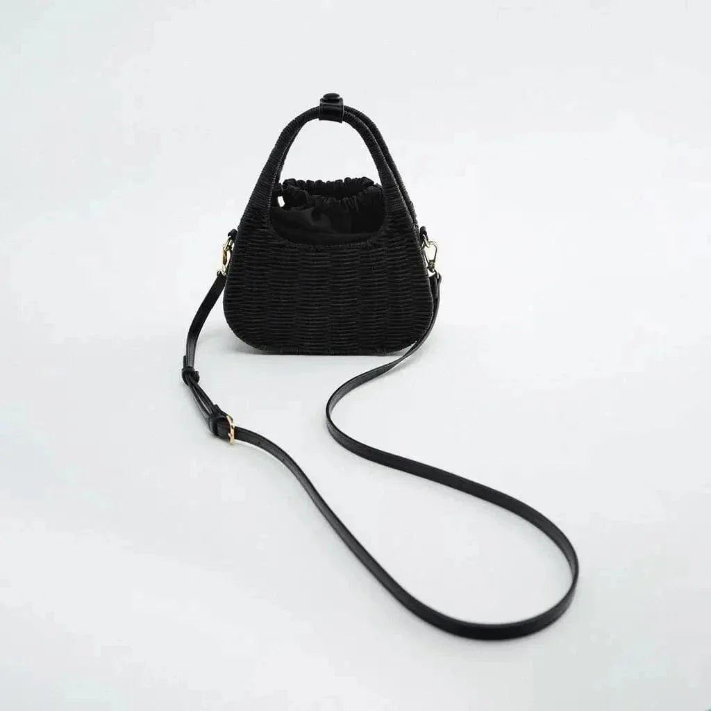 Wicker Summer Bag for Women, Natural Summer Vacation Purse in Black, styled as a SheSelects summer accessory