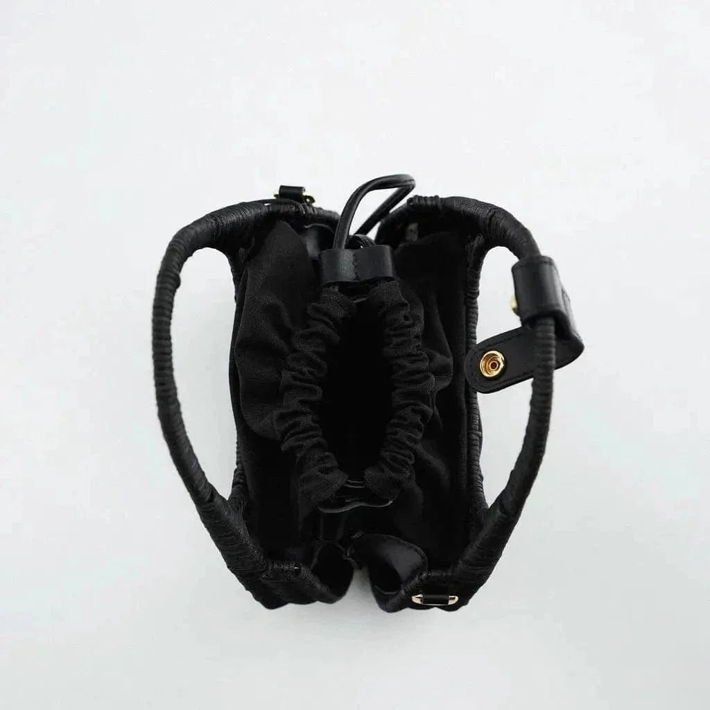 Wicker Summer Bag for Women, Natural Summer Vacation Purse in Black, styled as a SheSelects summer accessory